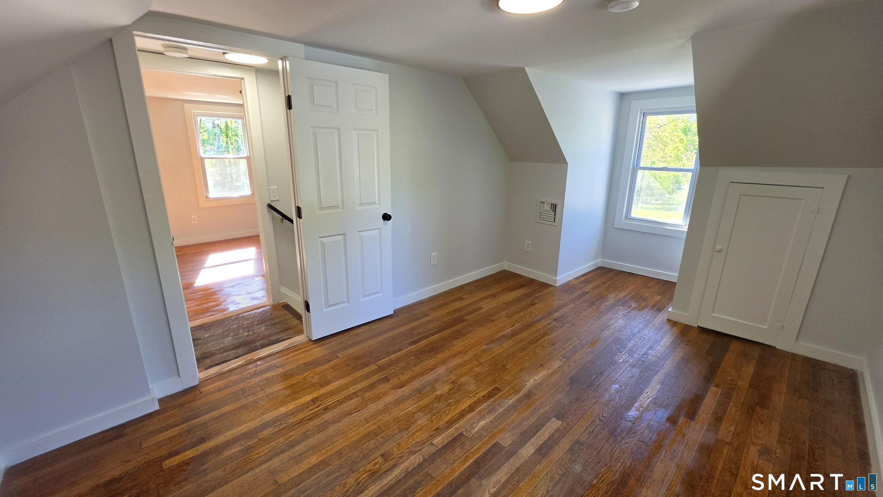2 Maria Hotchkiss Road Prospect, CT 06712 - Photo 16 of 17 a view of an empty room with wooden floor and a window