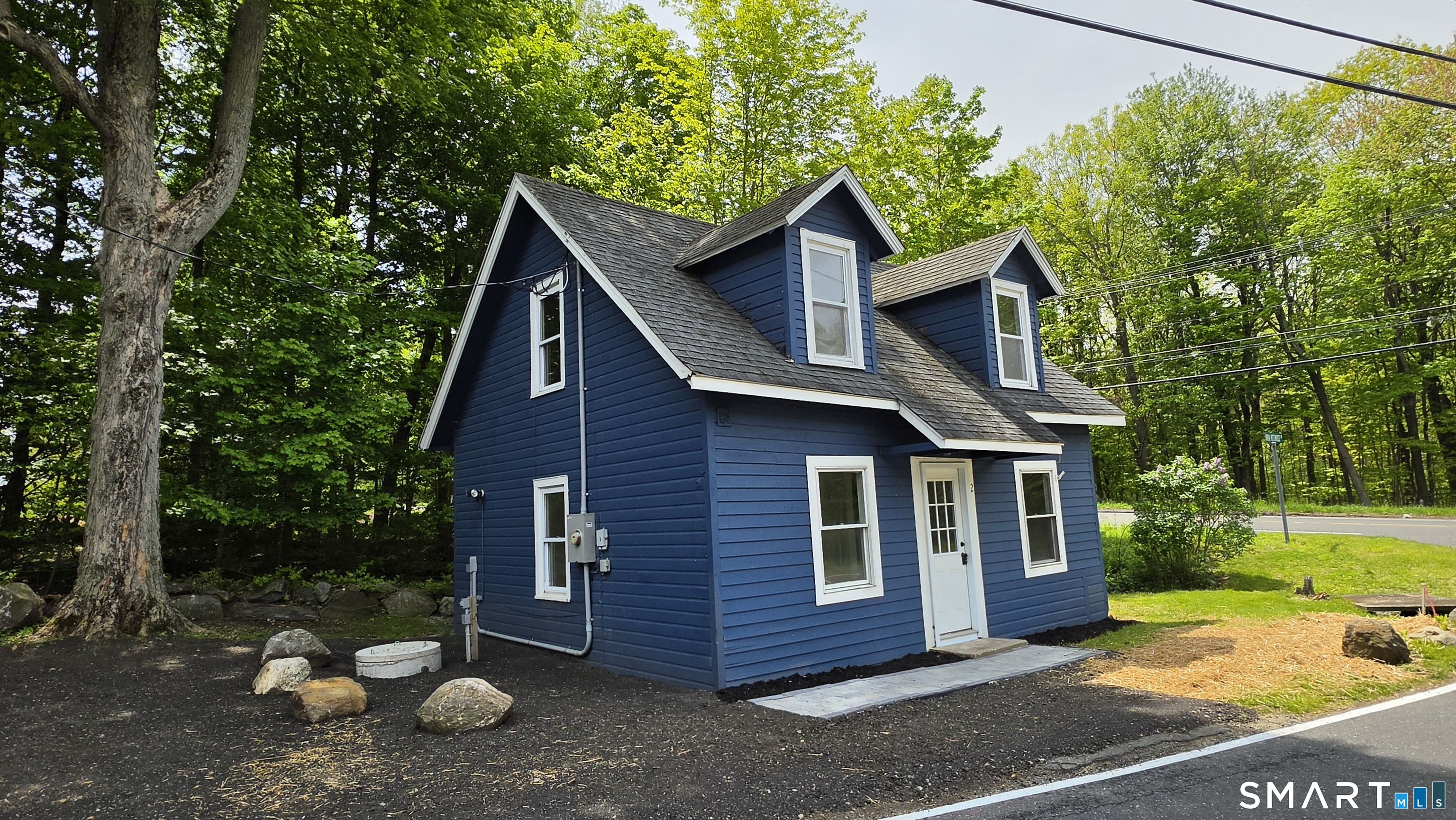 2 Maria Hotchkiss Road Prospect, CT 06712 - Photo 2 of 17 a front view of a house with a yard