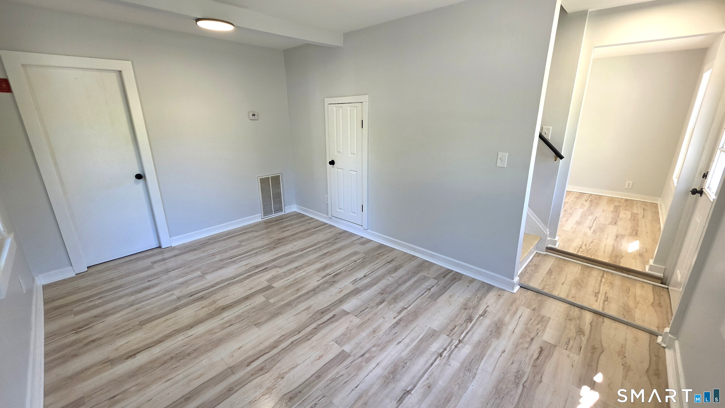 2 Maria Hotchkiss Road Prospect, CT 06712 - Photo 7 of 17 an empty room with wooden floor and entrance
