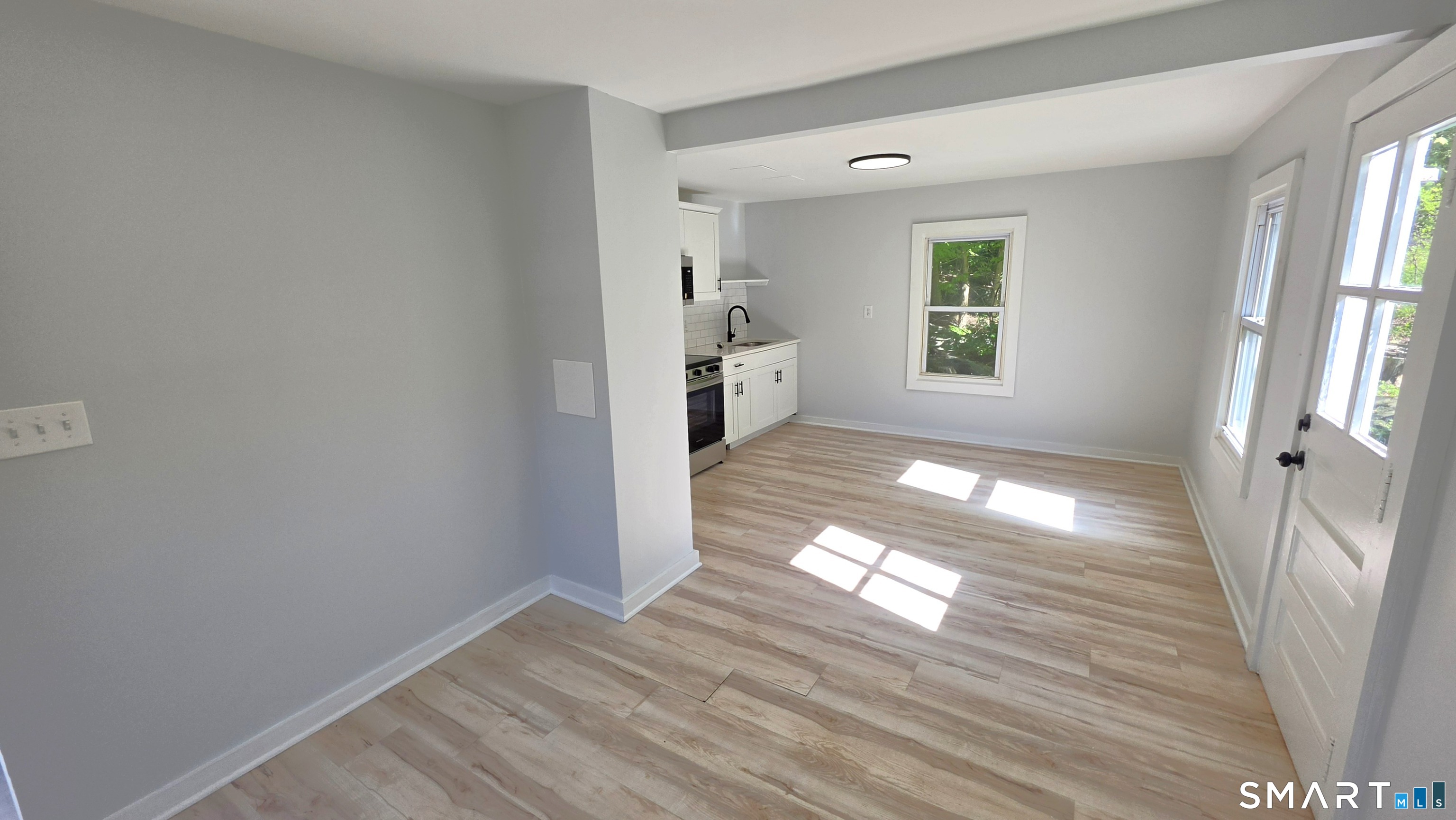 2 Maria Hotchkiss Road Prospect, CT 06712 - Photo 10 of 17 a view of empty room with wooden floor and window