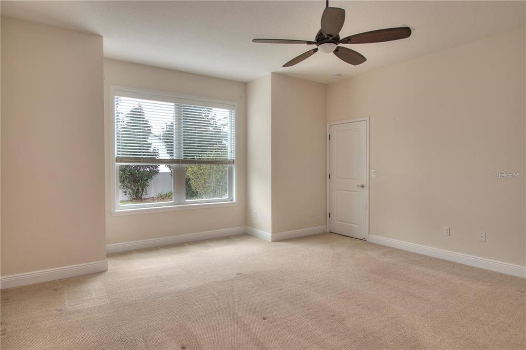 1922 Southeast 29th Street Ocala, FL 34471 - Photo 12 of 29 an empty room with windows and entrance