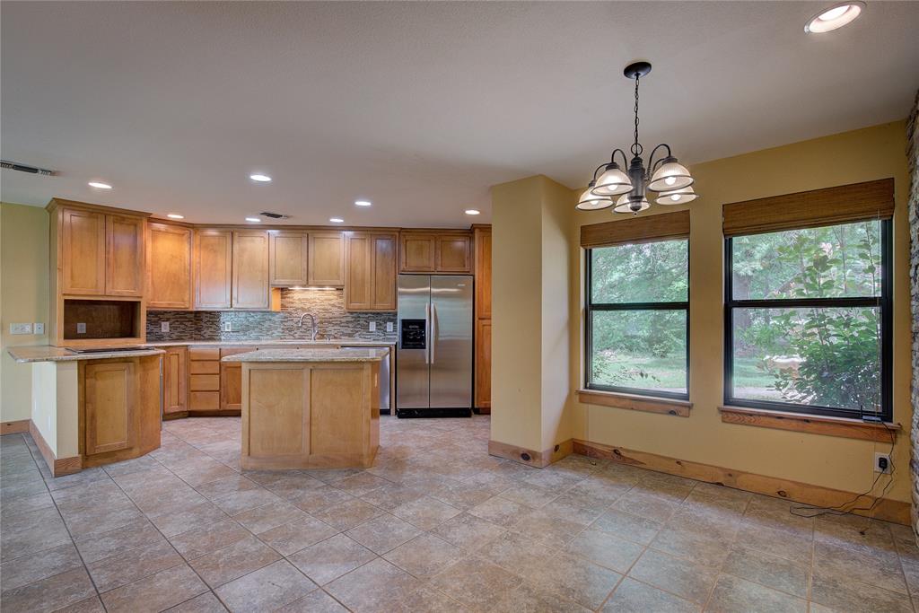 1920 County Rd SE 3370 Winnsboro, TX 75494 - Photo 16 of 40 a view of a kitchen with a sink and microwave