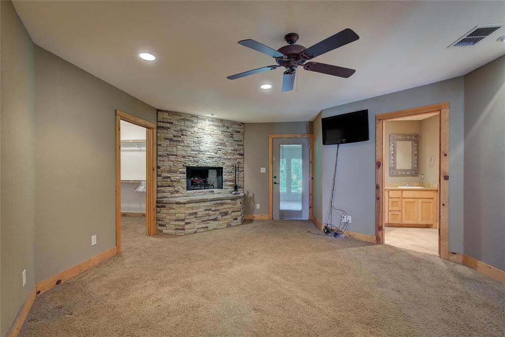 1920 County Rd SE 3370 Winnsboro, TX 75494 - Photo 17 of 40 a view of a livingroom with a flat screen tv