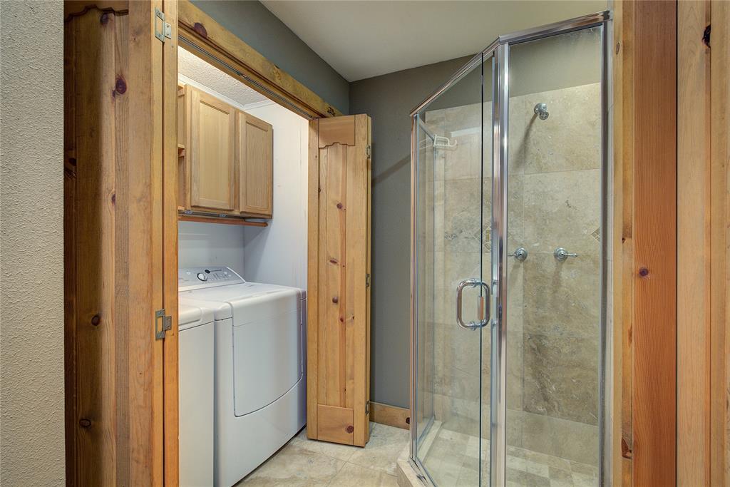 1920 County Rd SE 3370 Winnsboro, TX 75494 - Photo 19 of 40 a bathroom with a shower and a sink