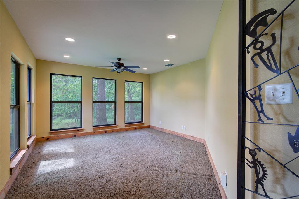 1920 County Rd SE 3370 Winnsboro, TX 75494 - Photo 22 of 40 a view of an empty room with a window