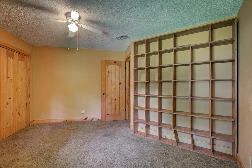 1920 County Rd SE 3370 Winnsboro, TX 75494 - Photo 23 of 40 a view of empty room with a ceiling fan