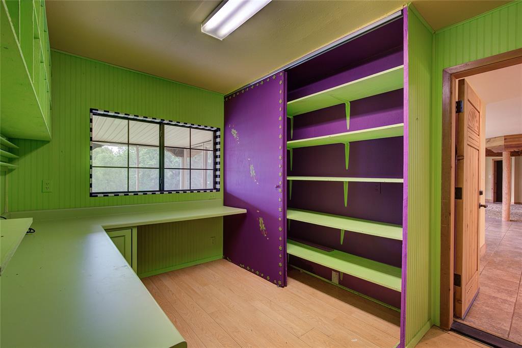 1920 County Rd SE 3370 Winnsboro, TX 75494 - Photo 26 of 40 a bedroom with a bed and a dresser