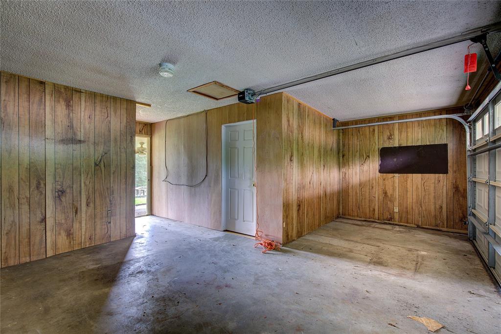1920 County Rd SE 3370 Winnsboro, TX 75494 - Photo 28 of 40 a view of a hallway with wooden walls
