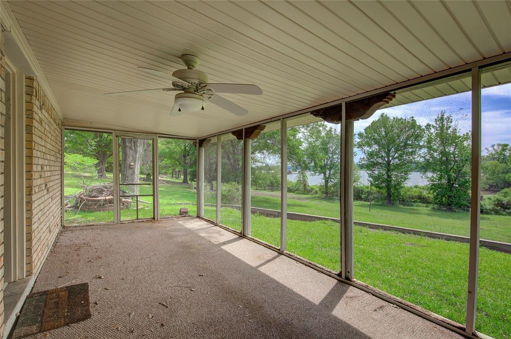 1920 County Rd SE 3370 Winnsboro, TX 75494 - Photo 29 of 40 a view of a room with porch and a backyard