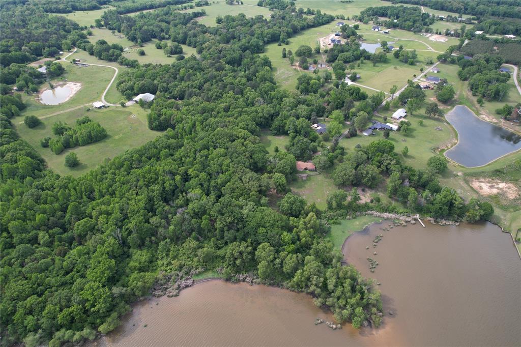 1920 County Rd SE 3370 Winnsboro, TX 75494 - Photo 39 of 40 an aerial view of a residential houses with yard and outdoor space