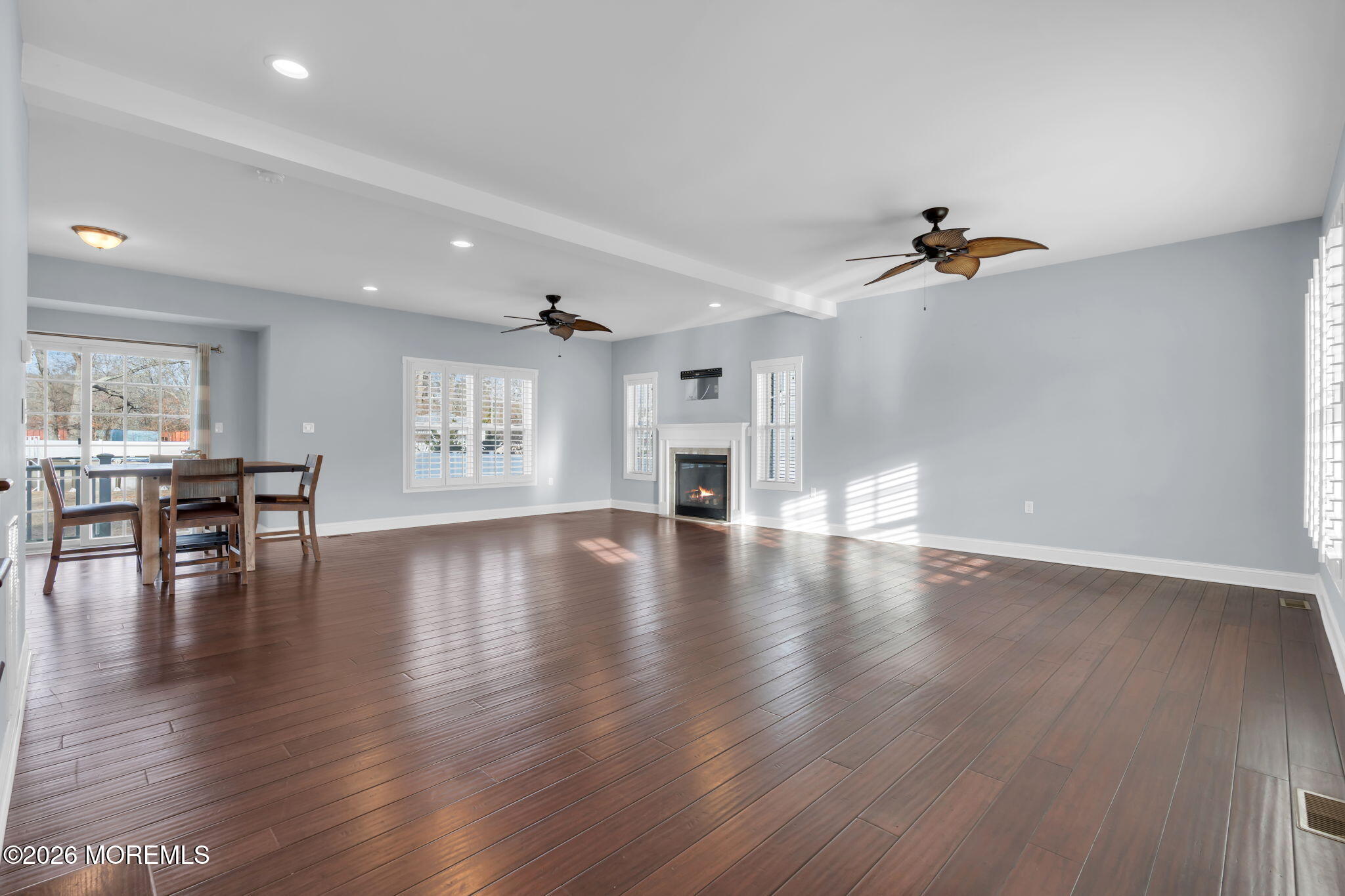 4 Conor Court Bayville, NJ 08721 - Photo 14 of 45 a view of a livingroom with furniture wooden floor and a kitchen