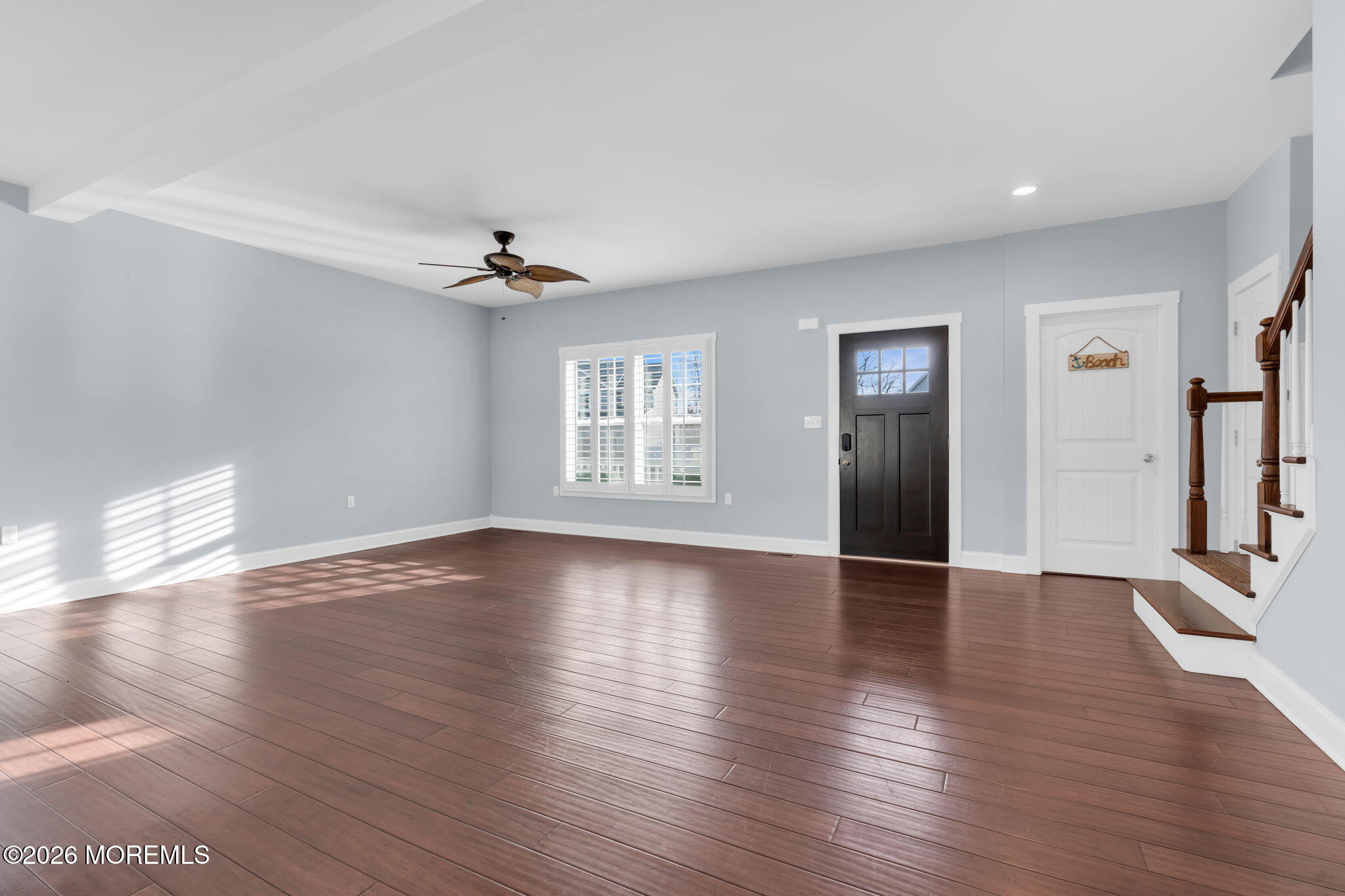 4 Conor Court Bayville, NJ 08721 - Photo 15 of 45 a view of an empty room with window and wooden floor