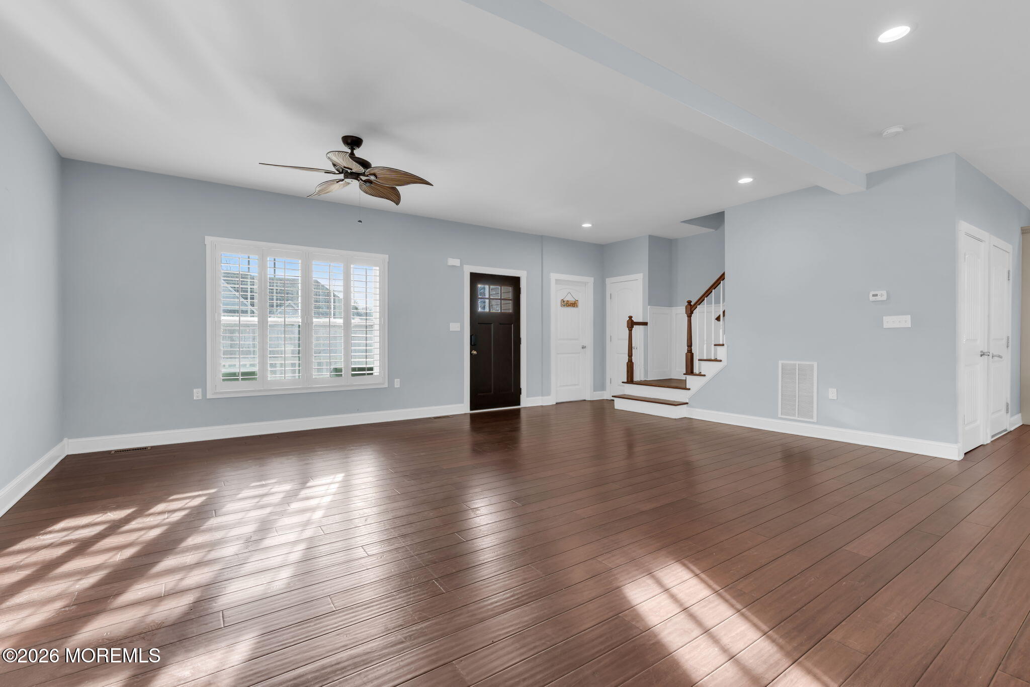 4 Conor Court Bayville, NJ 08721 - Photo 16 of 45 a view of an empty room with wooden floor and a window