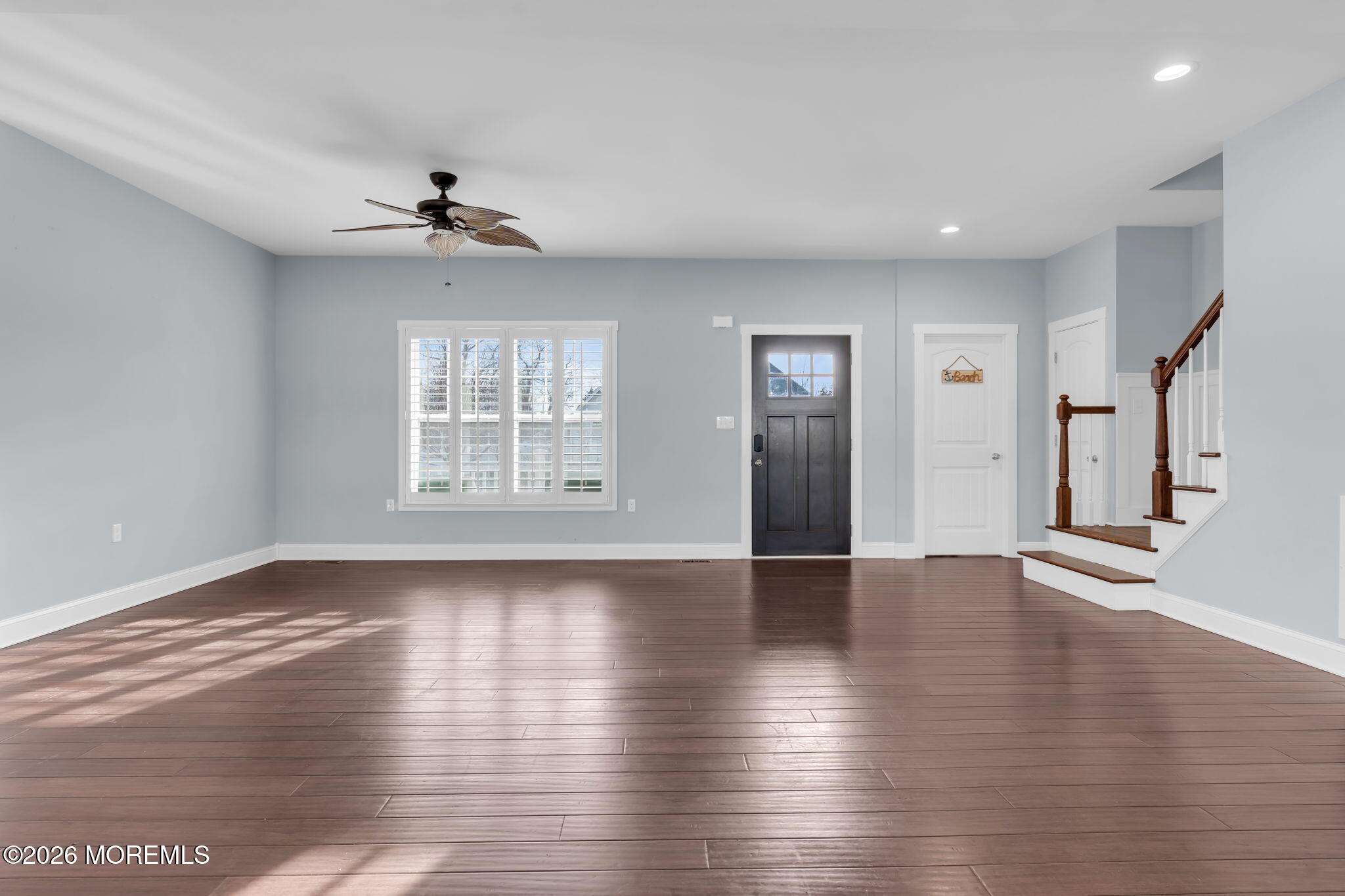 4 Conor Court Bayville, NJ 08721 - Photo 17 of 45 a view of an empty room with wooden floor and a window