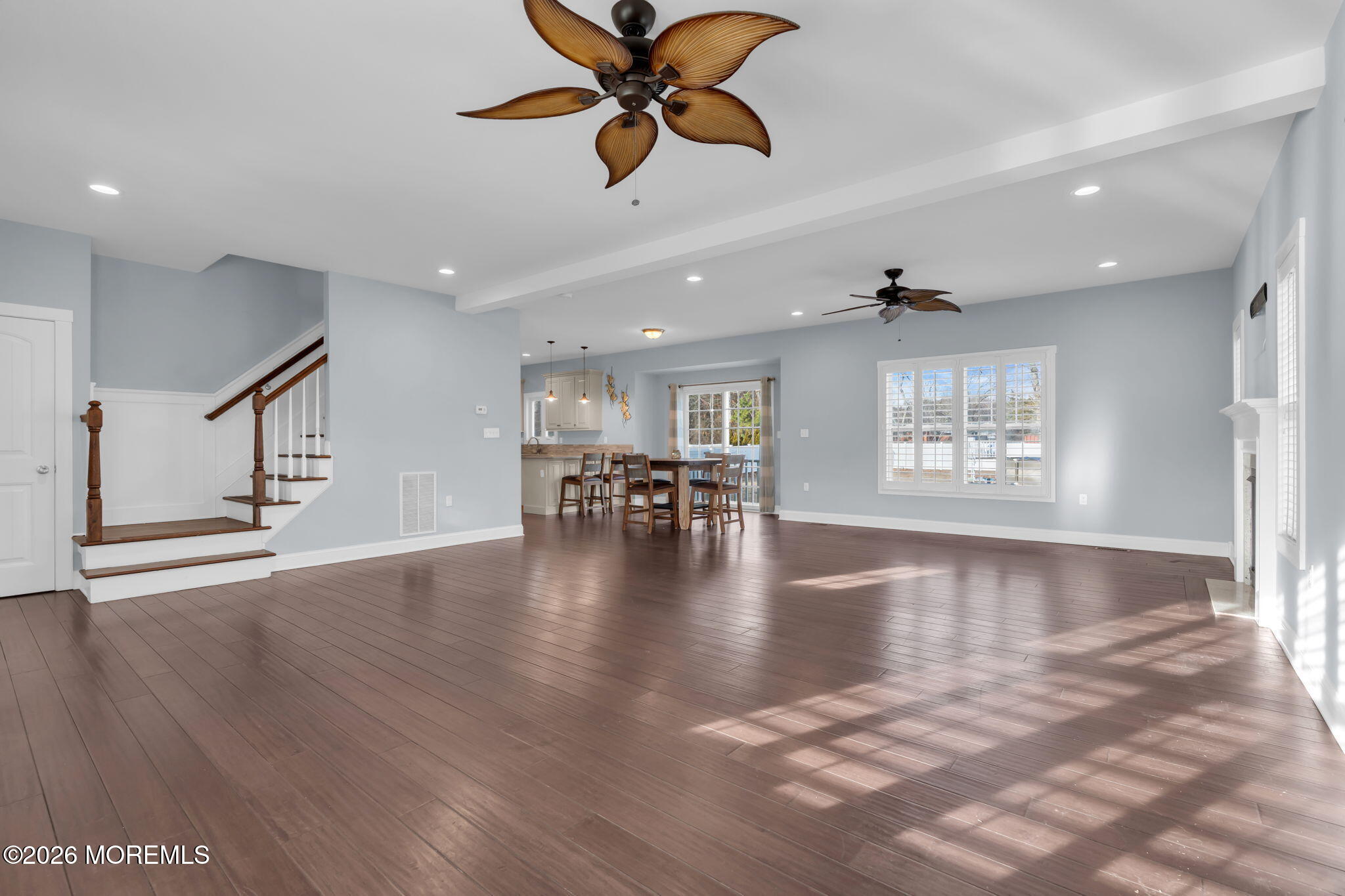 4 Conor Court Bayville, NJ 08721 - Photo 18 of 45 a view of a livingroom with hardwood floor and a ceiling fan