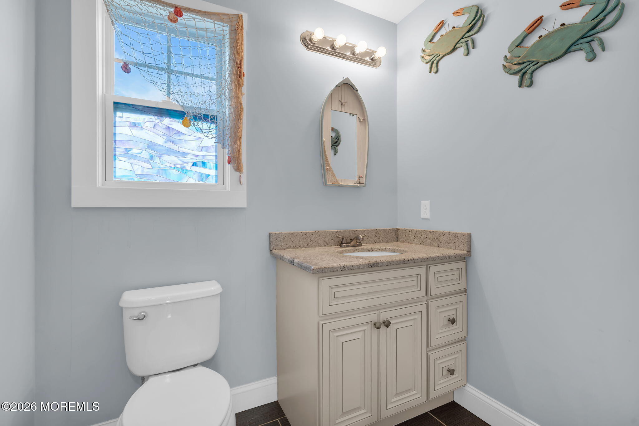 4 Conor Court Bayville, NJ 08721 - Photo 23 of 45 a bathroom with a toilet a sink and mirror