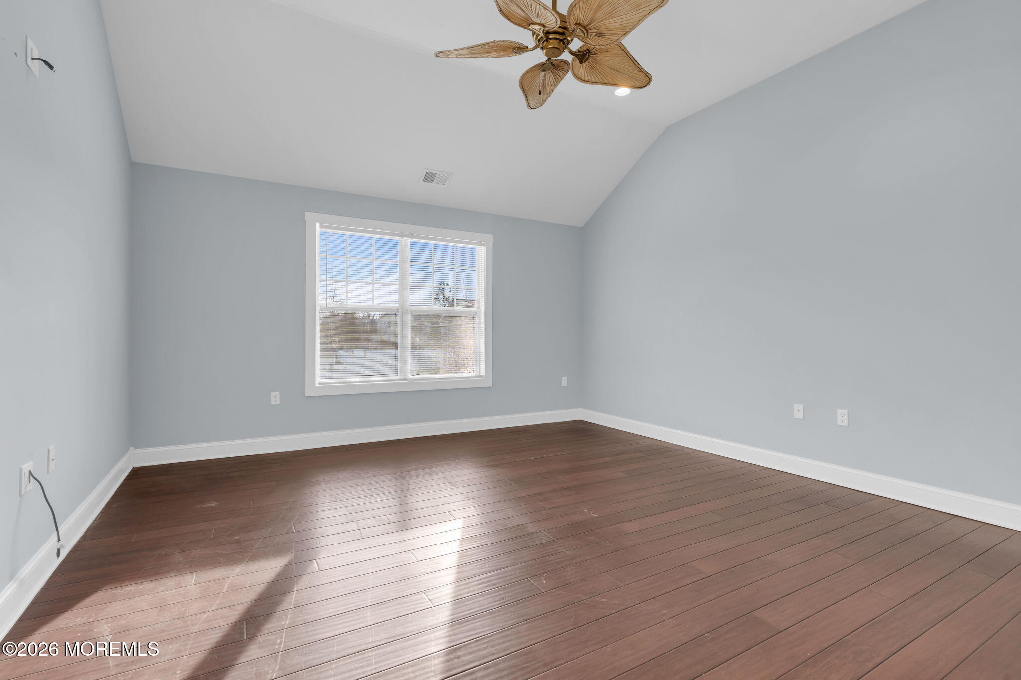 4 Conor Court Bayville, NJ 08721 - Photo 26 of 45 a view of an empty room with wooden floor and a window