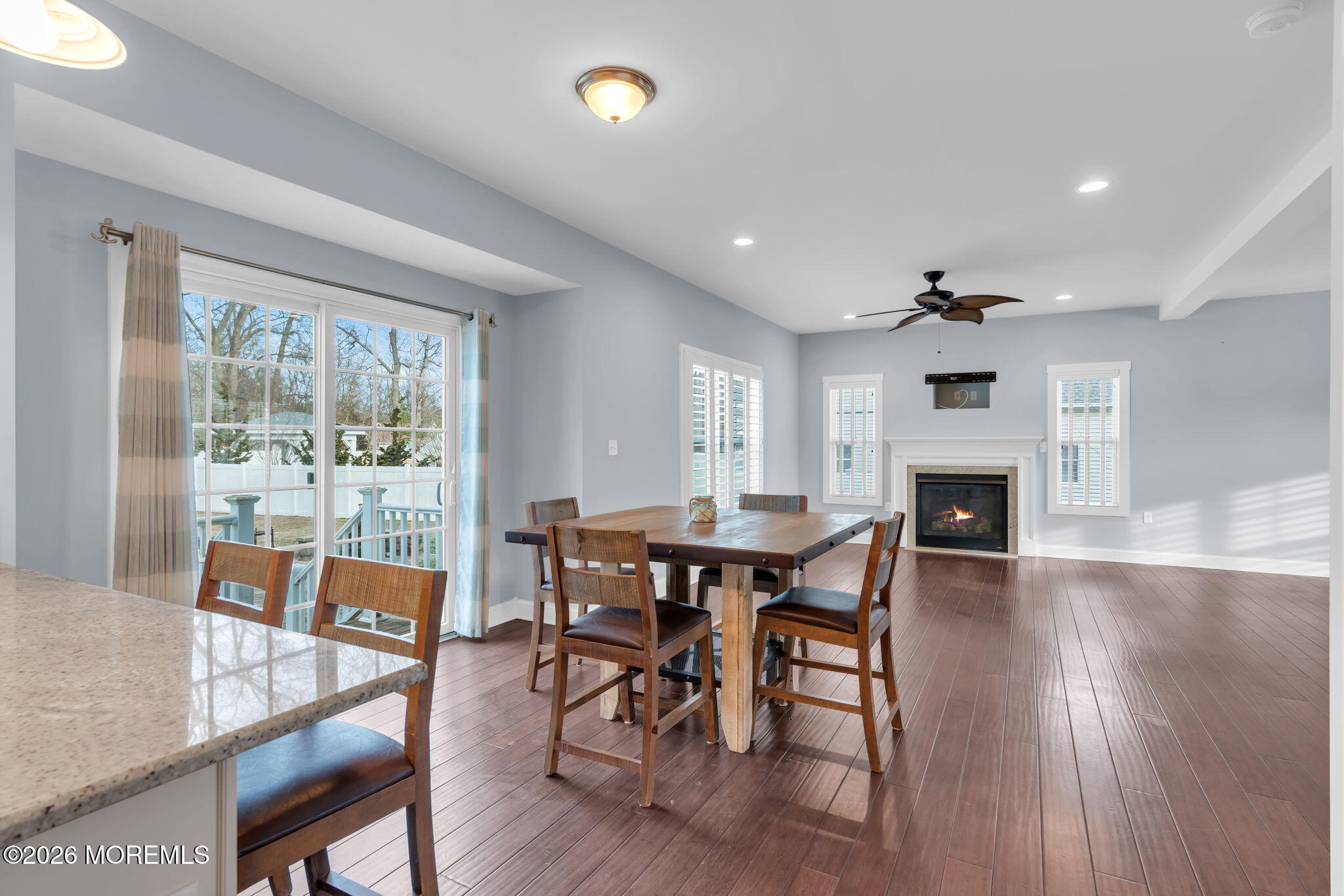4 Conor Court Bayville, NJ 08721 - Photo 32 of 45 a view of a dining room with furniture window and wooden floor