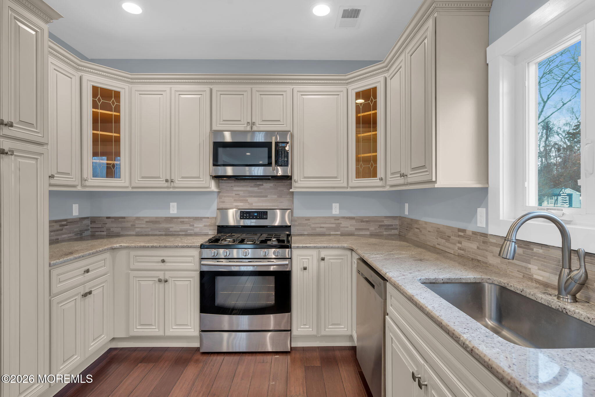 4 Conor Court Bayville, NJ 08721 - Photo 39 of 45 a kitchen with stainless steel appliances granite countertop a stove a sink and a microwave