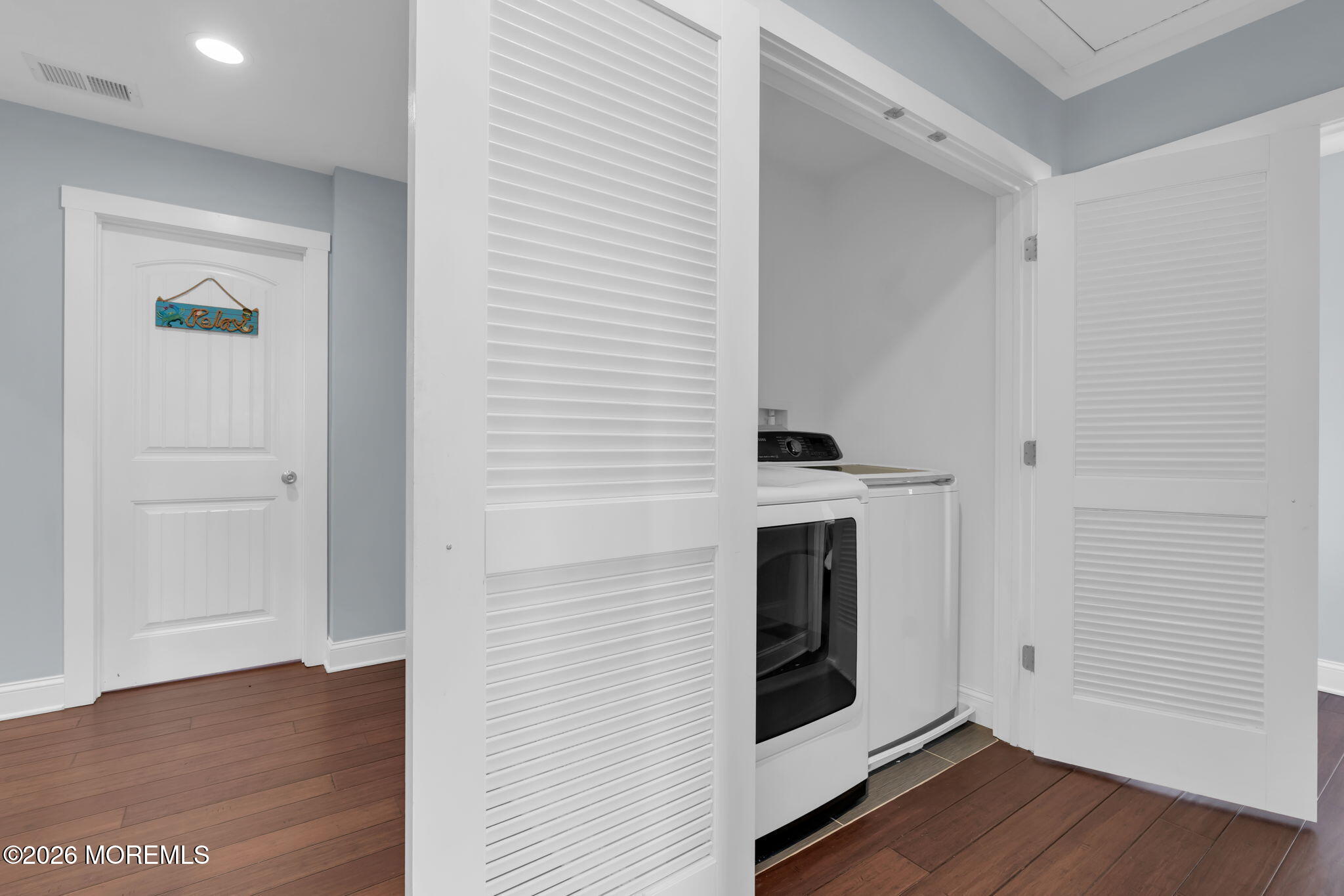 4 Conor Court Bayville, NJ 08721 - Photo 42 of 45 a view of a livingroom with wooden floor and an empty space