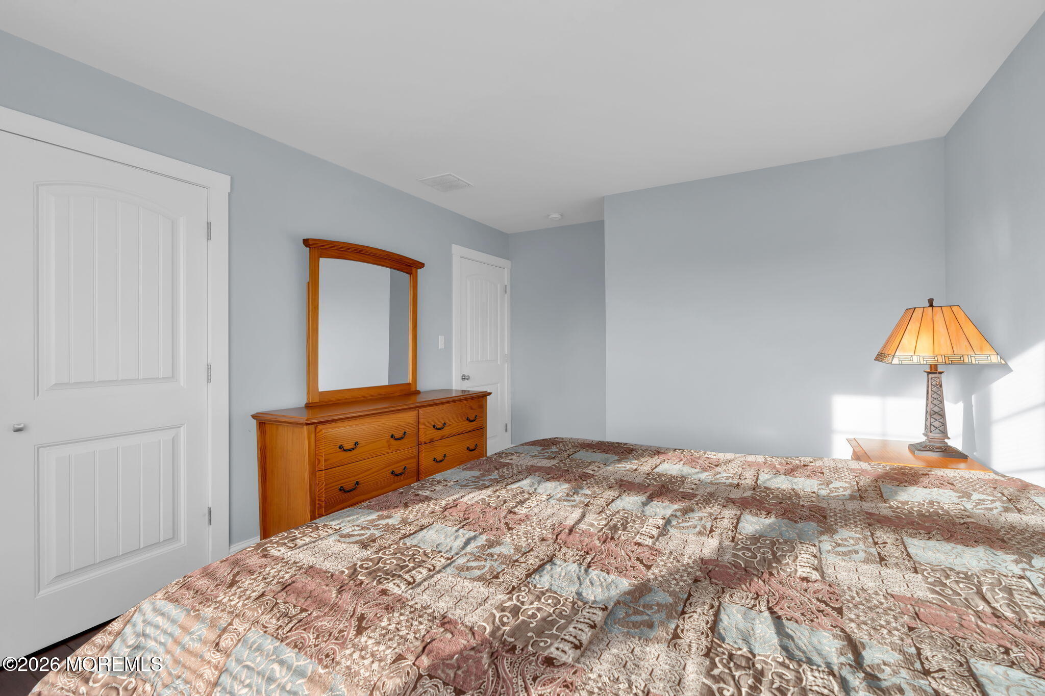 4 Conor Court Bayville, NJ 08721 - Photo 44 of 45 a bedroom with a bed and a closet
