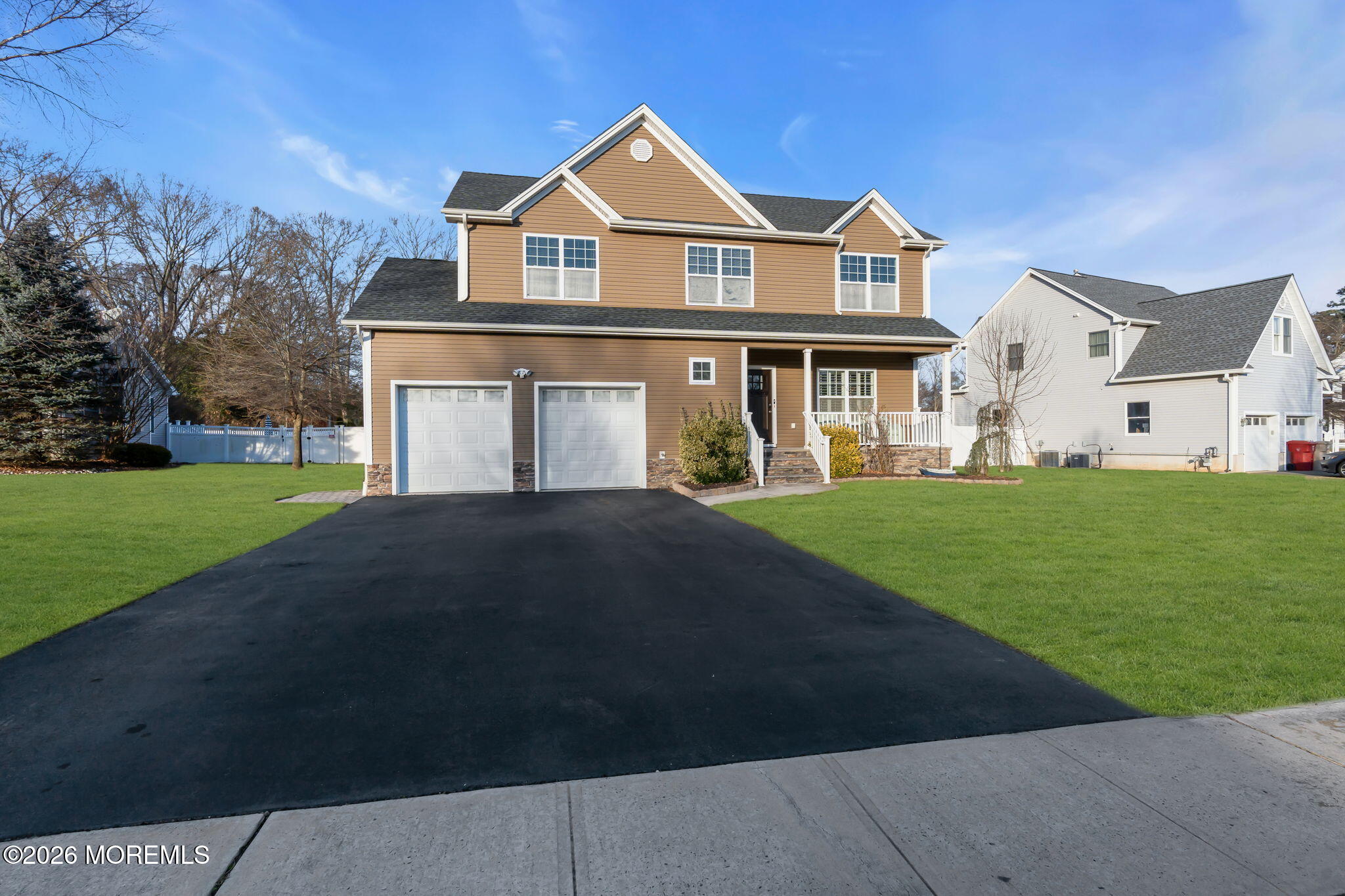 4 Conor Court Bayville, NJ 08721 - Photo 9 of 45 a front view of a house with a yard