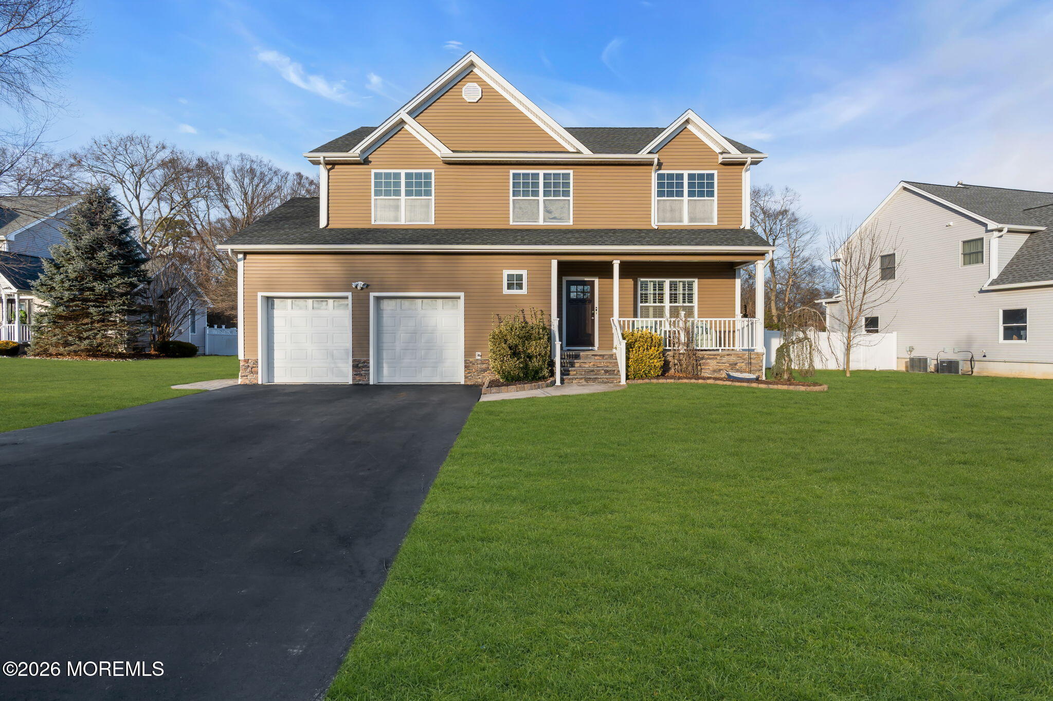 4 Conor Court Bayville, NJ 08721 - Photo 10 of 45 a front view of a house with a yard