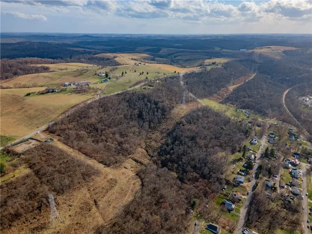 a view of roof with wooden floor