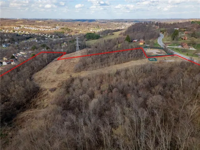 a view of a backyard of a house