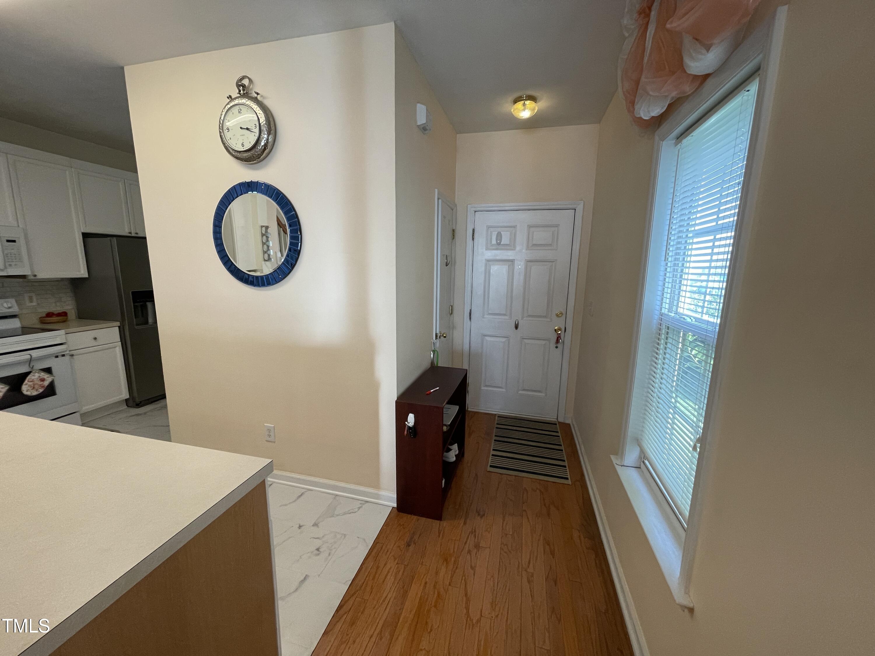 2041 Metacomet Way Raleigh, NC 27604 - Photo 4 of 67 a view of a storage & utility room with a window