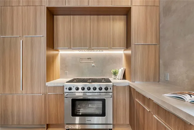 a living room with a couch and chairs