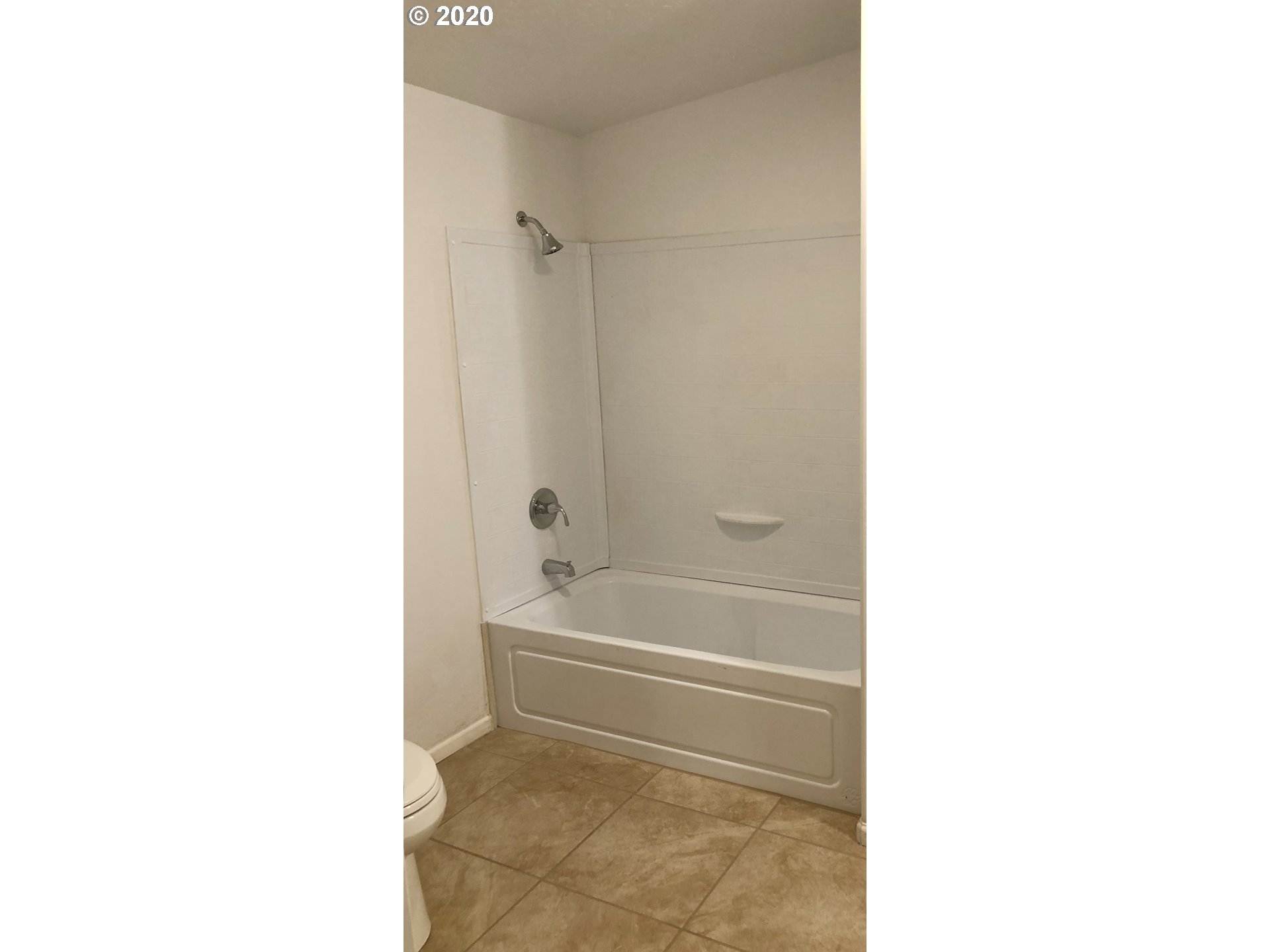 96465 Coverdell Road Brookings, OR 97415 - Photo 11 of 17 a bathroom with a bathtub and a shower