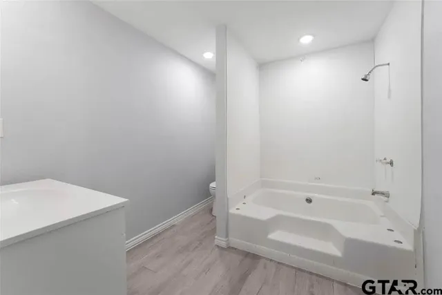 a bathroom with a bathtub
