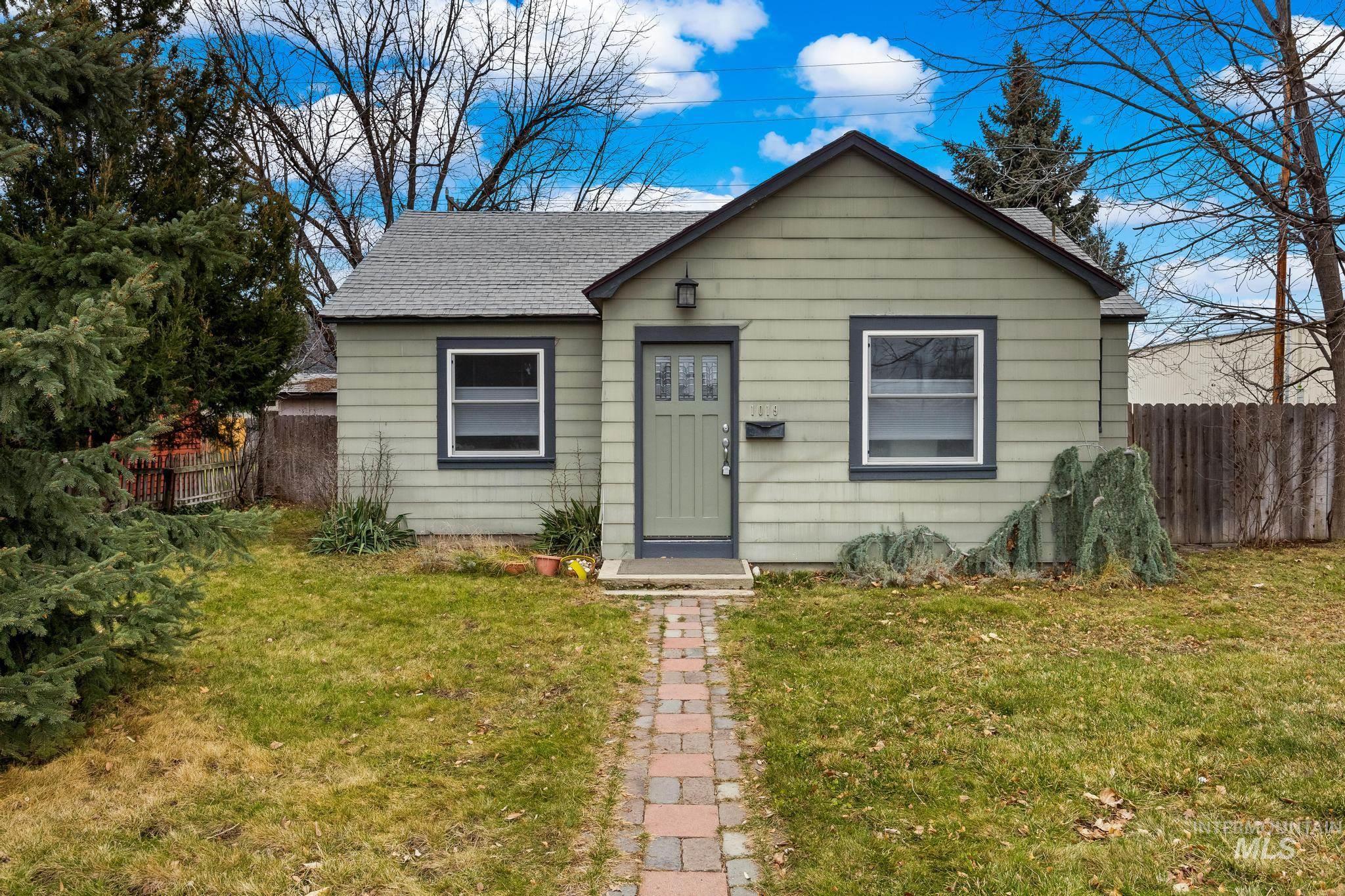 1019 North 30th Street Boise, ID 83702 - Photo 1 of 26 Bungalow-style home featuring roof with shingles