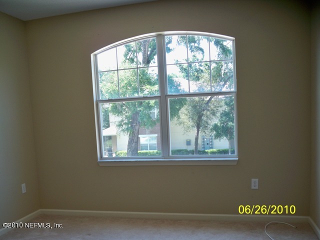 5663 Greenland Road, Unit 1002 Jacksonville, FL 32258 - Photo 5 of 9 master bedroom