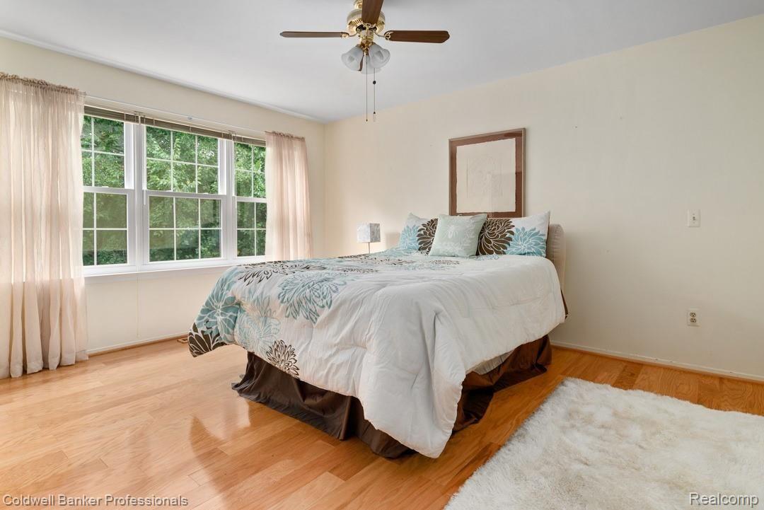 495 Bolinger Street Rochester, MI 48307 - Photo 16 of 30 Large master bedroom with gleaming hardwood floors