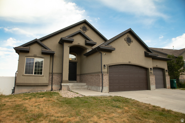 3365 Falcon Way Layton, UT 84040 - Photo 26 of 27 Front of Home 3 Car Garage