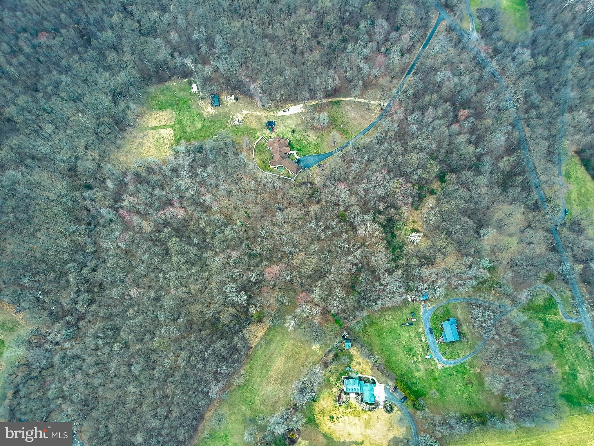12801 Van Brady Road Upper Marlboro, MD 20772 - Photo 11 of 11 a backyard of a house with outdoor seating and green space