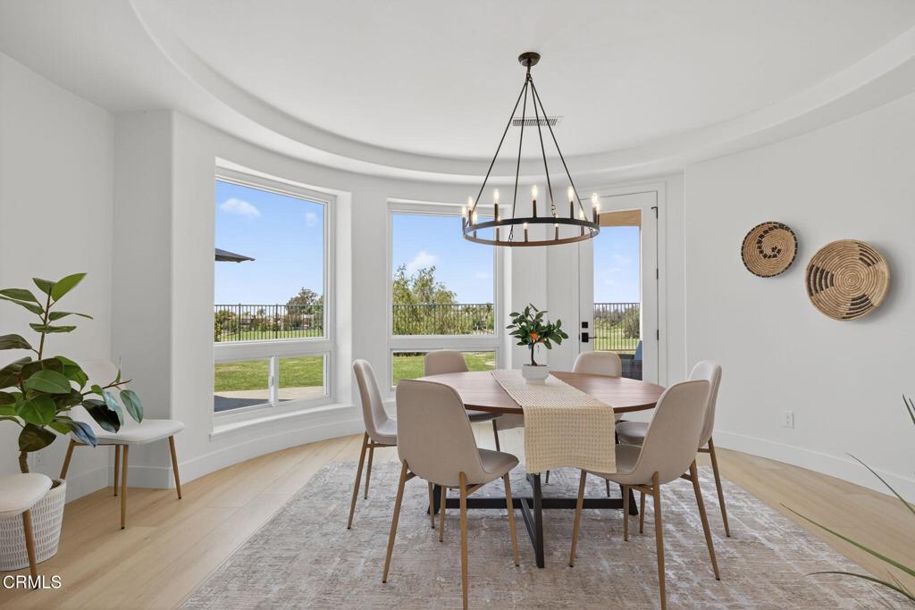 2967 Avenida De Autlan Camarillo, CA 93010 - Photo 12 of 78 a view of a dining room with furniture window and wooden floor