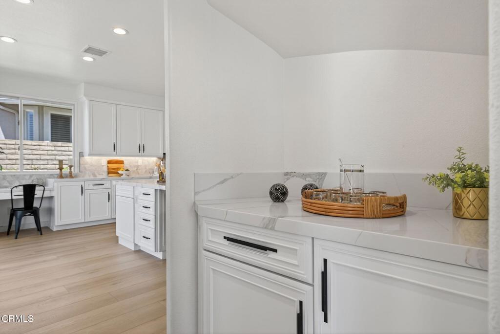 2967 Avenida De Autlan Camarillo, CA 93010 - Photo 23 of 78 a kitchen with a refrigerator and a stove top oven