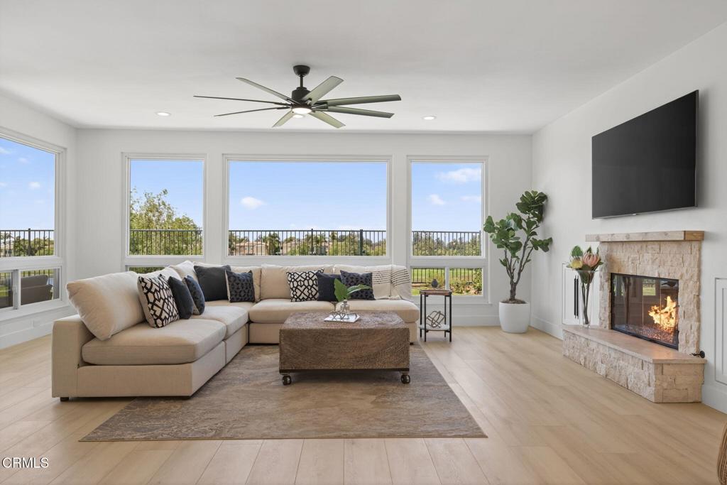 2967 Avenida De Autlan Camarillo, CA 93010 - Photo 25 of 78 a living room with furniture fireplace and flat screen tv