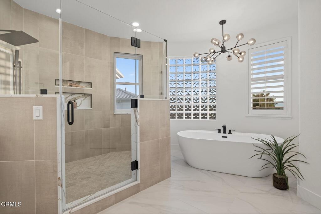 2967 Avenida De Autlan Camarillo, CA 93010 - Photo 42 of 78 a bathroom with a tub sink and shower