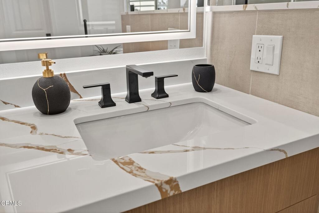 2967 Avenida De Autlan Camarillo, CA 93010 - Photo 44 of 78 a kitchen with a sink and a mirror