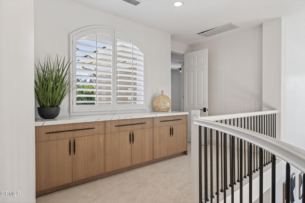 2967 Avenida De Autlan Camarillo, CA 93010 - Photo 48 of 78 a bathroom with a granite countertop sink and a large mirror