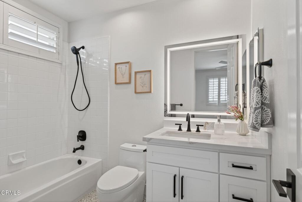 2967 Avenida De Autlan Camarillo, CA 93010 - Photo 54 of 78 a bathroom with a granite countertop sink a toilet and shower