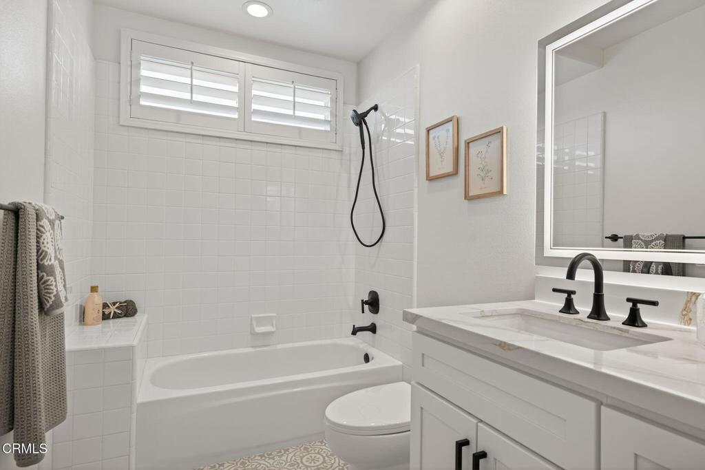 2967 Avenida De Autlan Camarillo, CA 93010 - Photo 55 of 78 a bathroom with a granite countertop sink a toilet and a tub