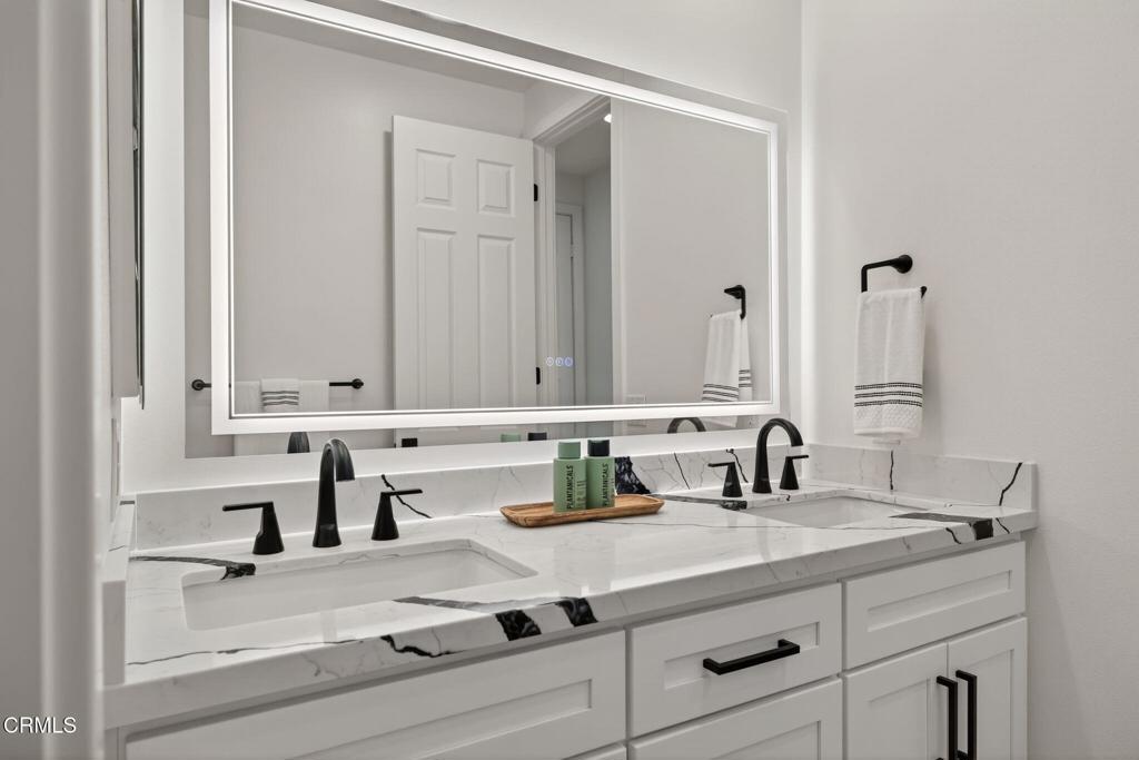 2967 Avenida De Autlan Camarillo, CA 93010 - Photo 60 of 78 a bathroom with a sink and a mirror