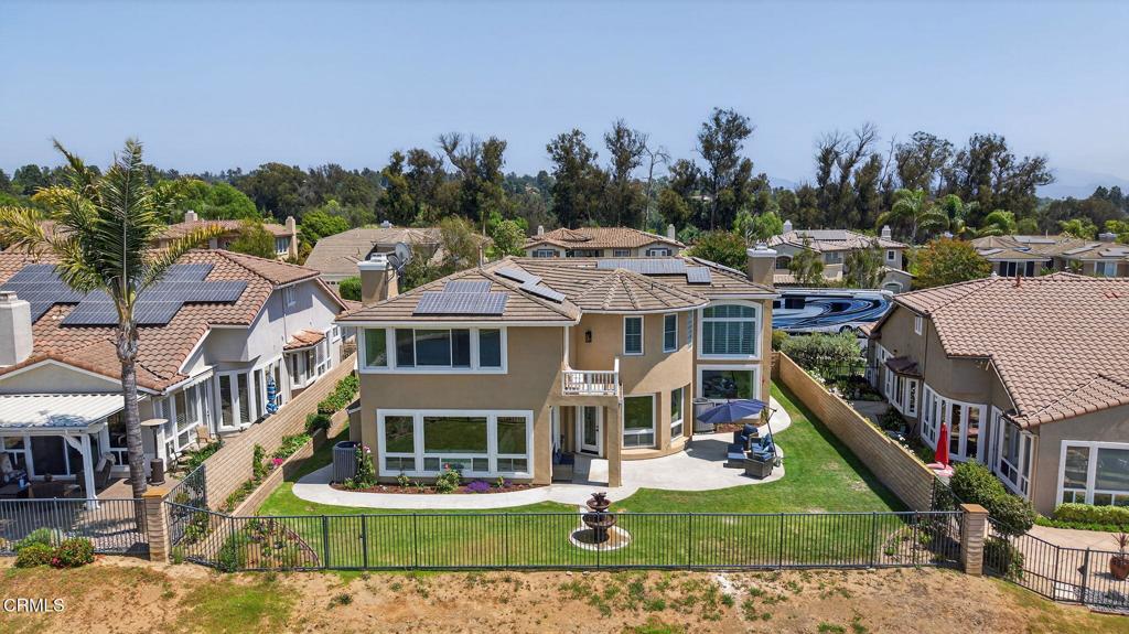 2967 Avenida De Autlan Camarillo, CA 93010 - Photo 63 of 78 a view of a white house with a yard and potted plants