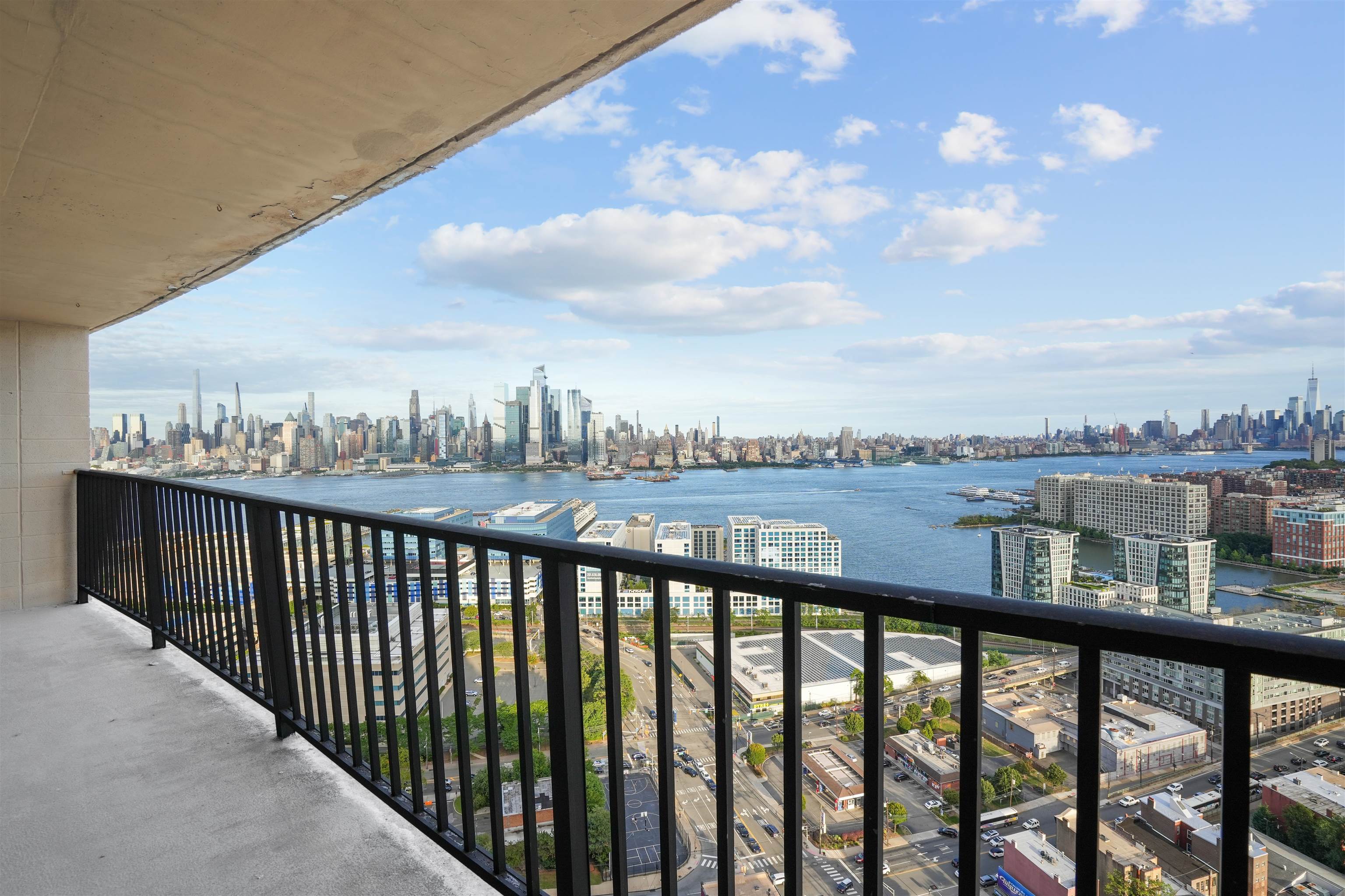 a view of city from a balcony