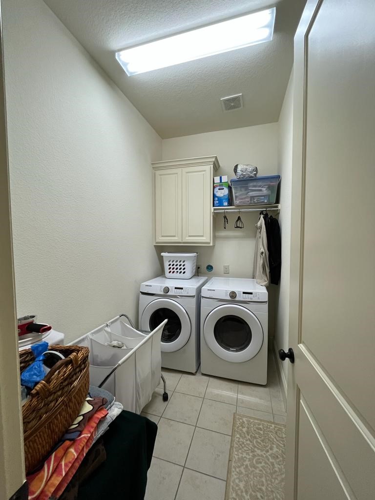 13117 Stoneleigh Terrace Drive Houston, TX 77077 - Photo 13 of 23 a utility room with sink dryer and washer